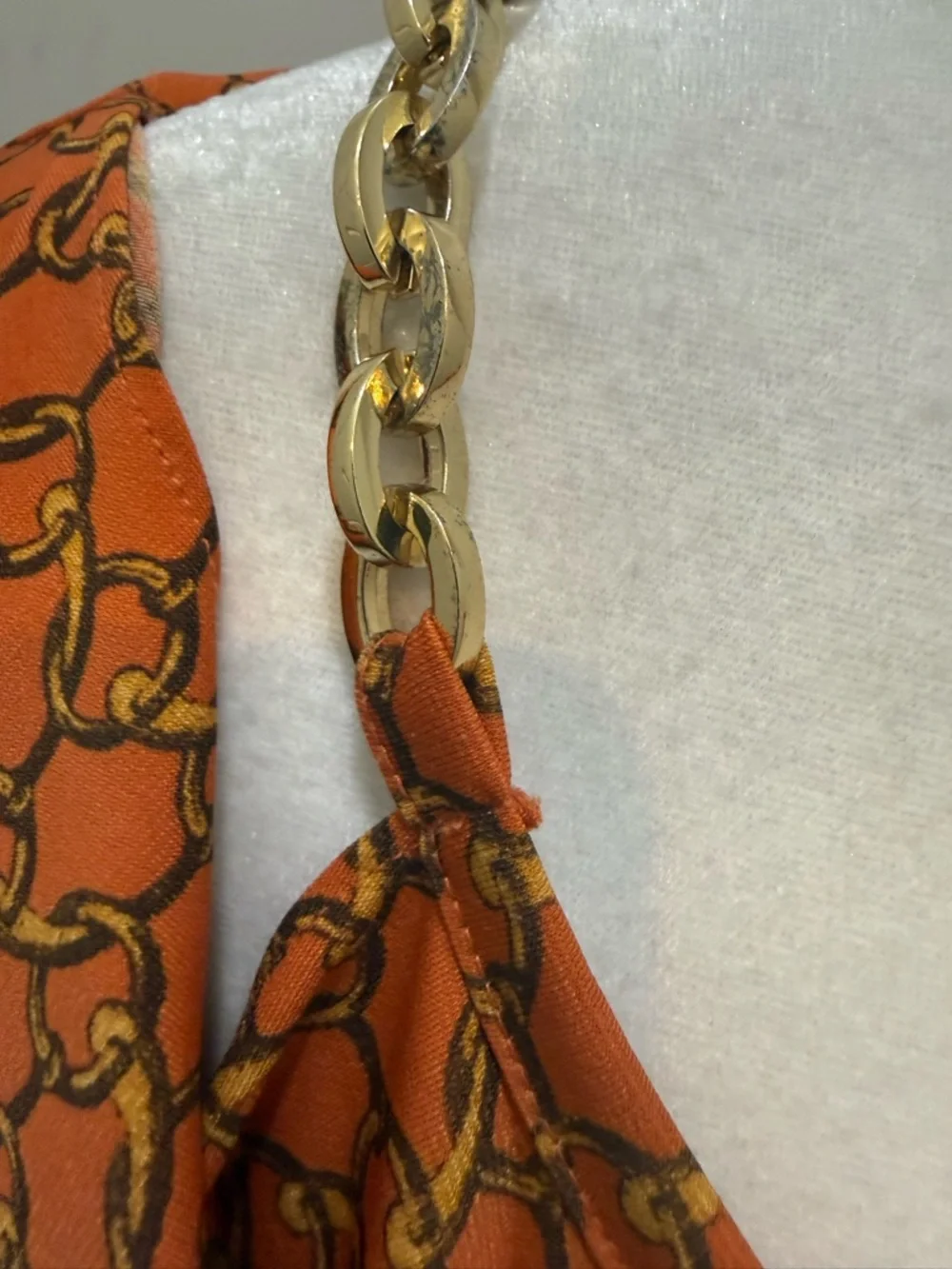 Michael Kors. Cold Shoulder Orange Chain Blouse. Size Small.